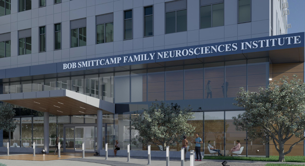 A rendering of the exterior of a medical building with "Bob Smittcamp Family Neurosciences Institute" sign on it.