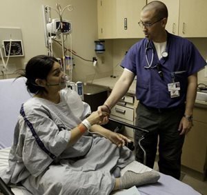 Patient shaking hands with doctor